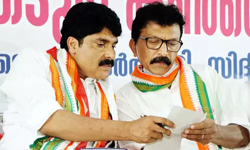 ​T Siddiq with PV Mohan