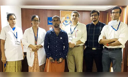 sumesh with hospital staff