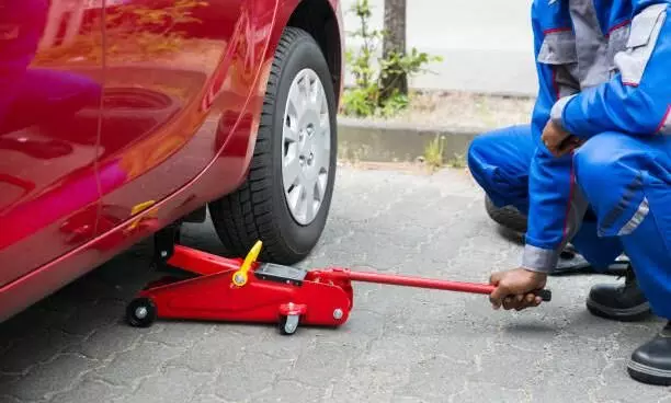 car lifting through hydraulic jack car lifting through hydraulic jack