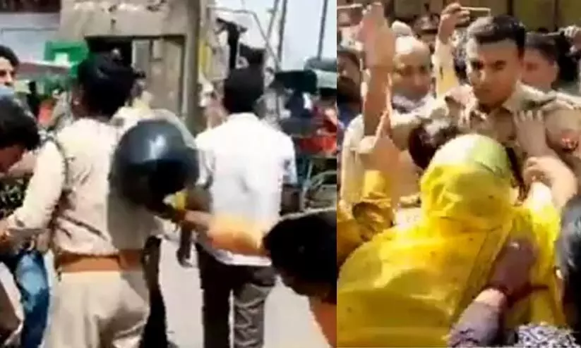 യു.പിയിൽ പൊലീസുകാരെ നടുറോഡിൽ വളഞ്ഞിട്ട് തല്ലി ആർ.എസ്.എസുകാർ; വിഡിയോ പുറത്ത് യു.പിയിൽ പൊലീസുകാരെ നടുറോഡിൽ വളഞ്ഞിട്ട് തല്ലി ആർ.എസ്.എസുകാർ; വിഡിയോ പുറത്ത്