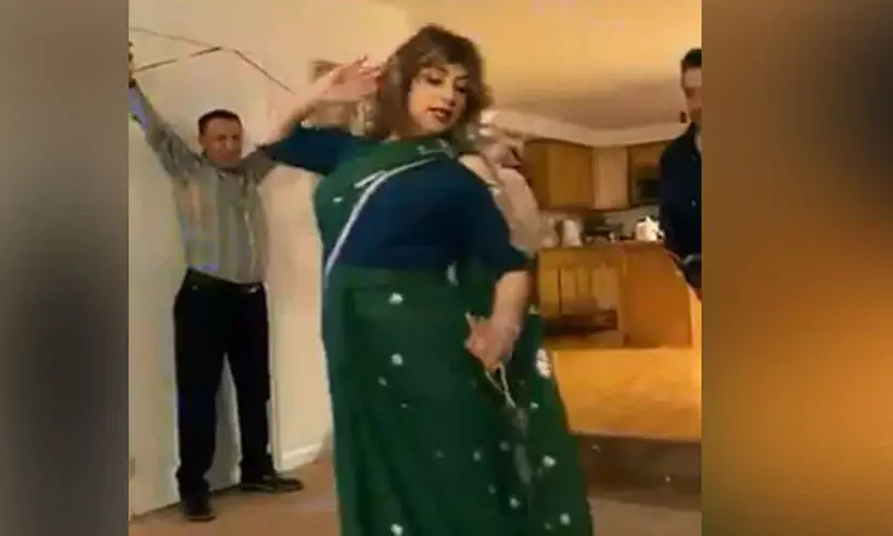 Iranian woman dancing for sholey movie song