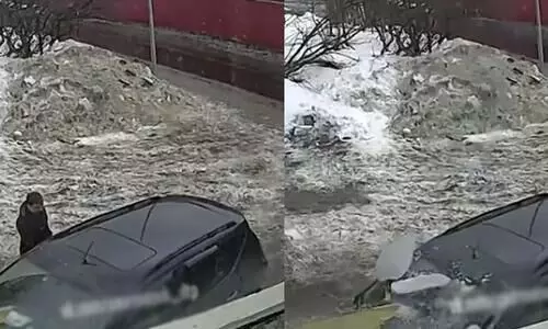 Couple was sitting inside their car when ice block fell on it Viral video