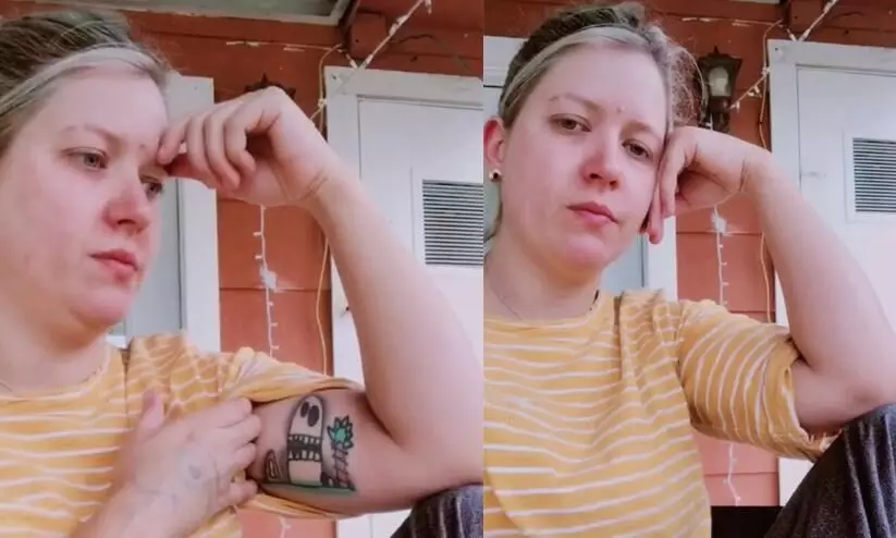 Woman gets tattoo of sons drawing on her arm, finds out it isnt his