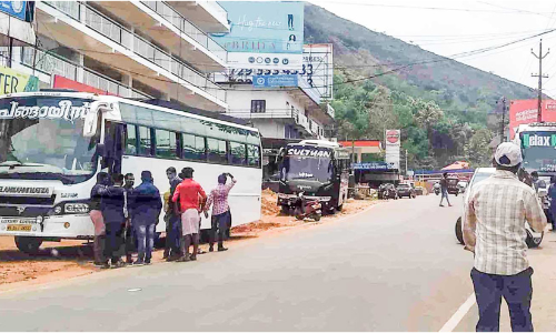 tourist bus with migrant laborers
