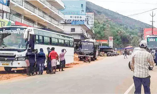 tourist bus with migrant laborers