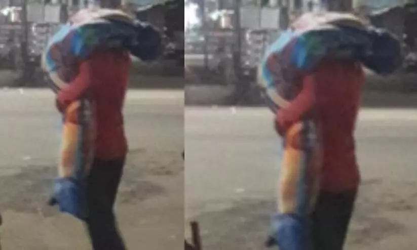 Man carries wifes body on shoulder to burial ground in Telanganas Kamareddy Man carries wifes body on shoulder to burial ground in Telanganas Kamareddy