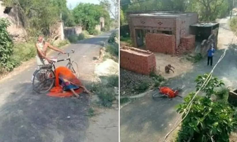 സംസ്​കരിക്കാൻ ഇടമില്ല: ഭാര്യയുടെ മൃതദേഹവുമായി വയോധികൻ സൈക്കിളിൽ ചുറ്റിത്തിരിഞ്ഞു; നരകസമാനമായി യു.പി