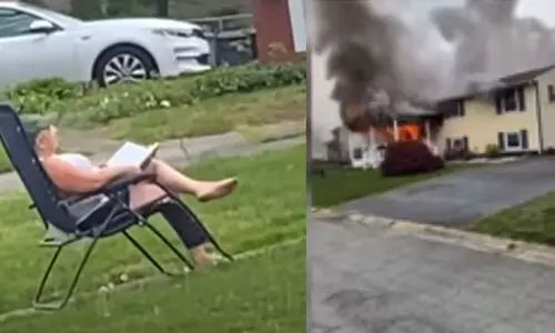 സ്വന്തം വീടിന് തീയിട്ട് മുറ്റത്ത് കസേരയില്‍ ഇരുന്ന് ആസ്വദിച്ച് സ്ത്രീ; വീഡിയോ വൈറല്‍