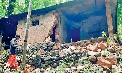 house collapsed in the rain
