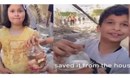 ഗസ്സയിലെ തകർന്ന വീട്ടിലേക്ക്​ ആ കുഞ്ഞുങ്ങൾ വീണ്ടുമെത്തി; വളർത്തുമീനുകളെ തേടി...