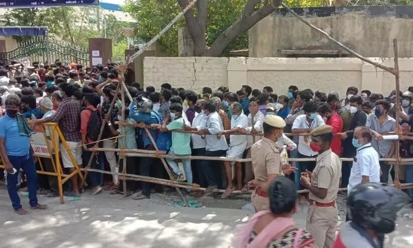 Social distancing tossed away as hundreds throng to buy Remdesivir at Chennai stadium