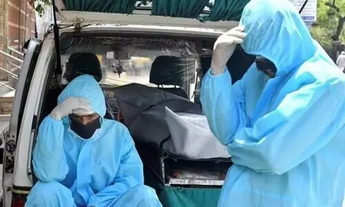 People with PPE Kits