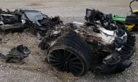 Charred 2021 McLaren GT up for sale. The pile of scarp