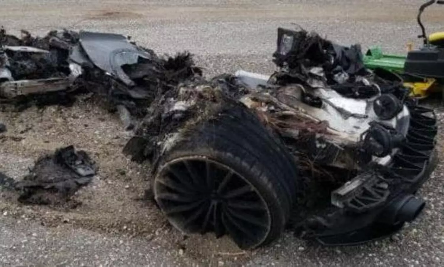 Charred 2021 McLaren GT up for sale. The pile of scarp