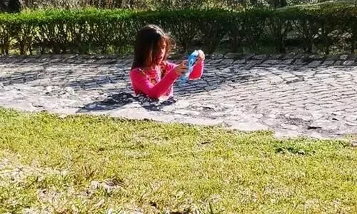 A Girl Stuck in Sidewalk