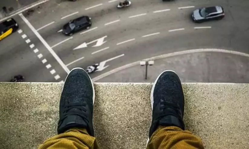attempt to jump from a building