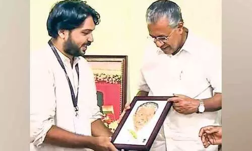 badusha with pinarayi