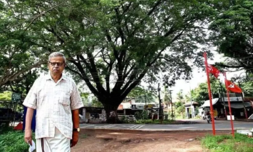 krishnan in front of the tree