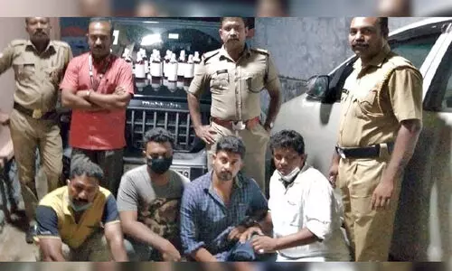 counterfeit liquor smuggling; arrest