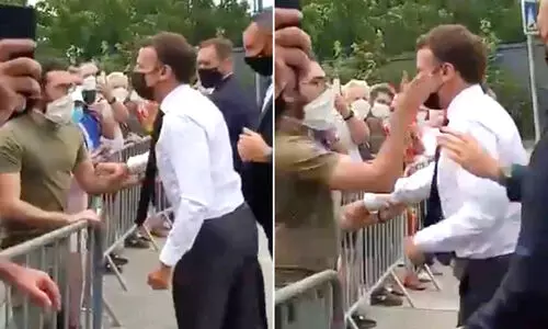 Emmanuel Macron slapping
