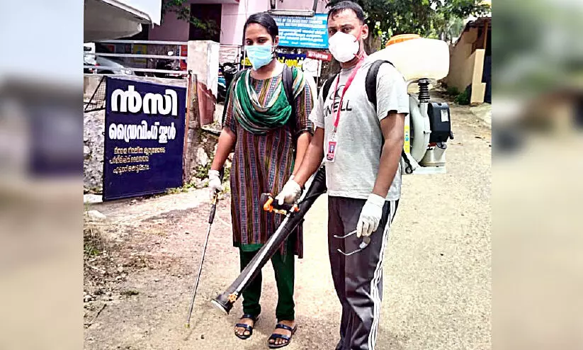 couple disinfected public place couple disinfected public place