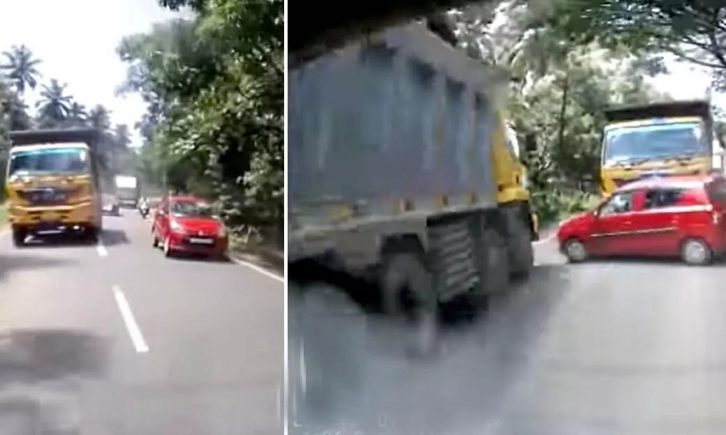 Car nearly gets sandwiched between two huge trucks after Car nearly gets sandwiched between two huge trucks after