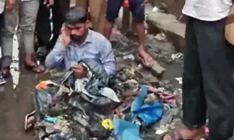 Shiv Sena MLA makes contractor sit on waterlogged road, gets garbage dumped on him