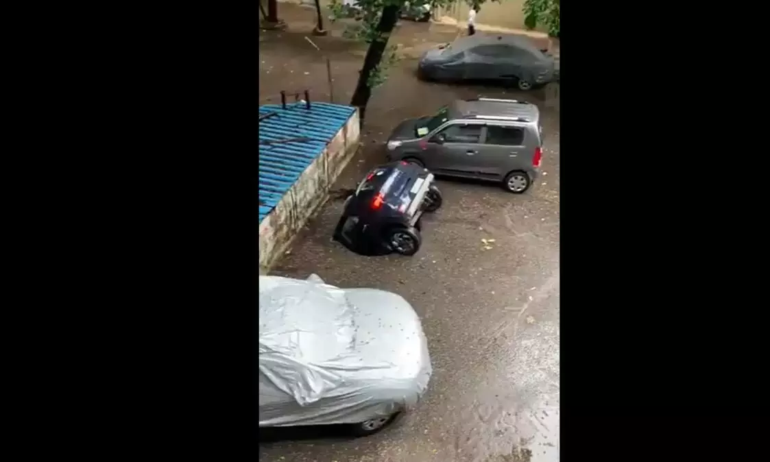 Video Car Swallowed By Sinkhole At Mumbai Parking