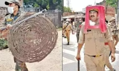 UP police using plastic stool