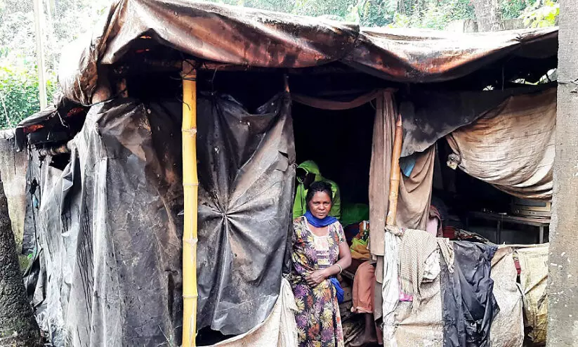 poor family in a hut poor family in a hut