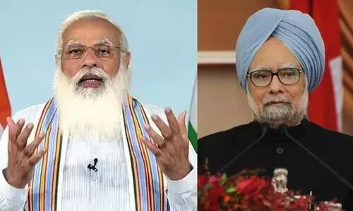 Naredndra Modi, Manmohan singh