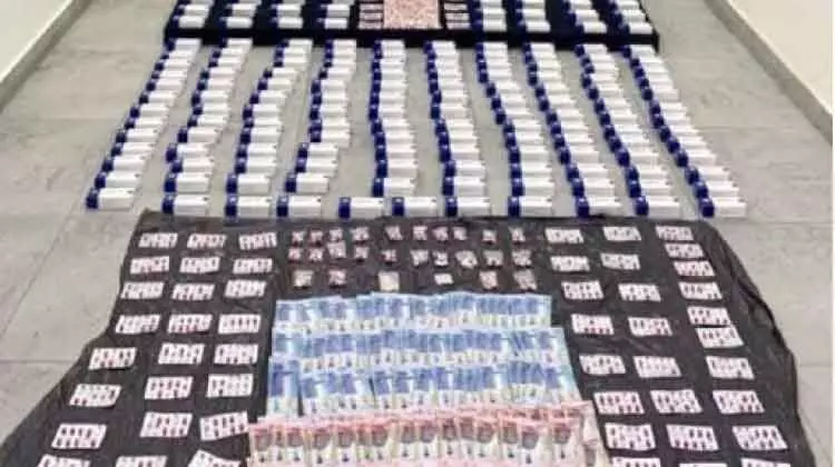 21,000 നി​രോ​ധി​ത ഗു​ളി​ക പി​ടി​കൂ​ടി