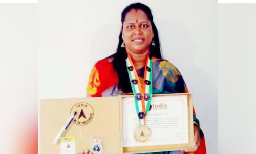 വ​നി​ത ദി​ന​ത്തി​ലെ ഫോ​ട്ടോ ഷൂ​ട്ട്‌: ബിനിജക്ക്​ ഇന്ത്യ ബുക്ക്​ ഓഫ് റെ​ക്കോഡ്സ് അംഗീകാരം