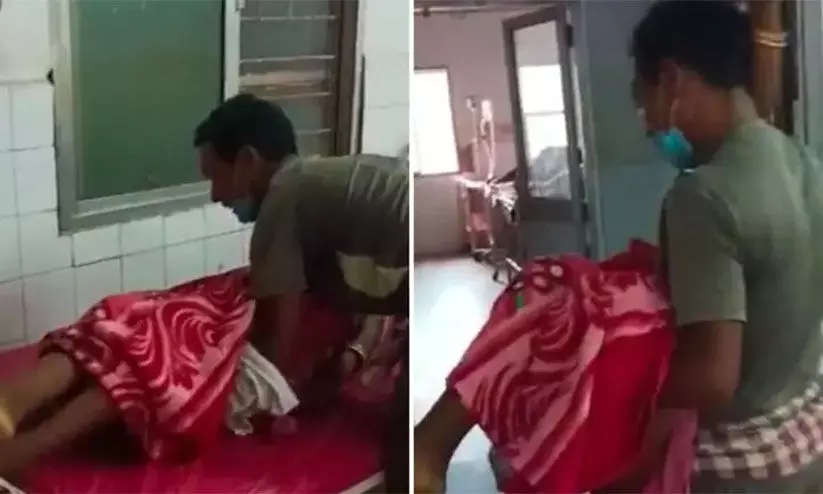 ഭാര്യയുടെ മൃതദേഹം ഒറ്റയ്ക്ക് ചുമന്ന് ബാലകൃഷ്ണ; സഹായിക്കേണ്ടവർ നോക്കുകുത്തികളായി ഭാര്യയുടെ മൃതദേഹം ഒറ്റയ്ക്ക് ചുമന്ന് ബാലകൃഷ്ണ; സഹായിക്കേണ്ടവർ നോക്കുകുത്തികളായി