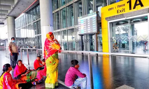 relatives waiting outside the airport