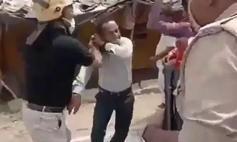 IAS Officer Thrashes Journalist In Public During UP Local Polls