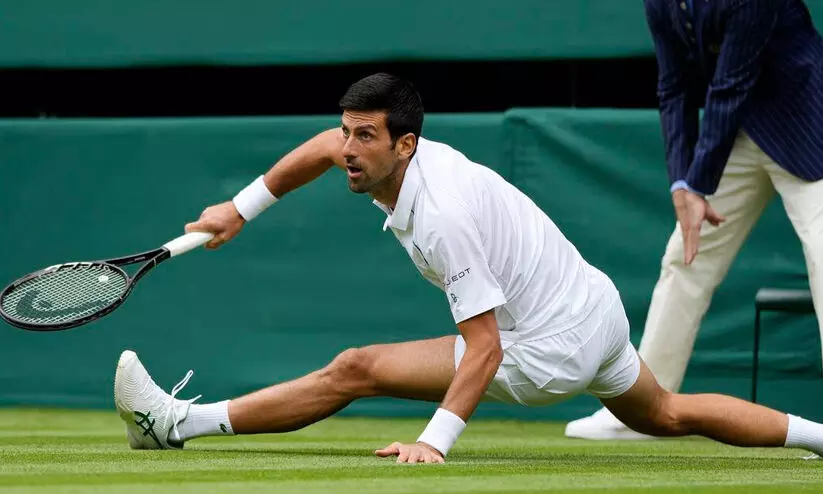 വിം​ബ്​​ൾ​ഡ​ണിലും കി​രീ​ടം ​ദ്യോ​കോ​വി​ച്ചി​ന്​; 20ാം ഗ്രാ​ൻ​ഡ്​​സ്ലാ​മു​മാ​യി ഫെ​ഡ​റ​ർ​ക്കും ന​ദാ​ലി​നു​മൊ​പ്പം