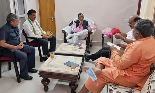 Uttarakhand Minister  Mask Hanging Off Toe