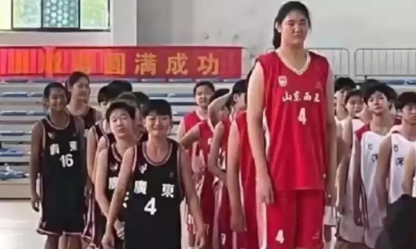 Video of 7foot 4 inch tall, 14 year old girl playing basketball in China