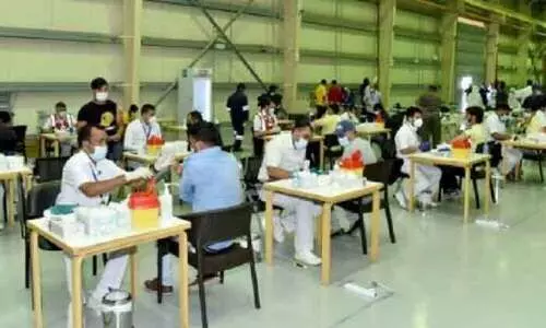 കെ.​എ​ൻ.​പി.​സി​യി​ൽ ഒ​റ്റ​ദി​വ​സം 10,000 പേ​ർ​ക്ക്​ വാ​ക്​​സി​ൻ ന​ൽ​കി