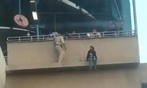 Faridabad cops save woman from jumping off metro station Video Viral