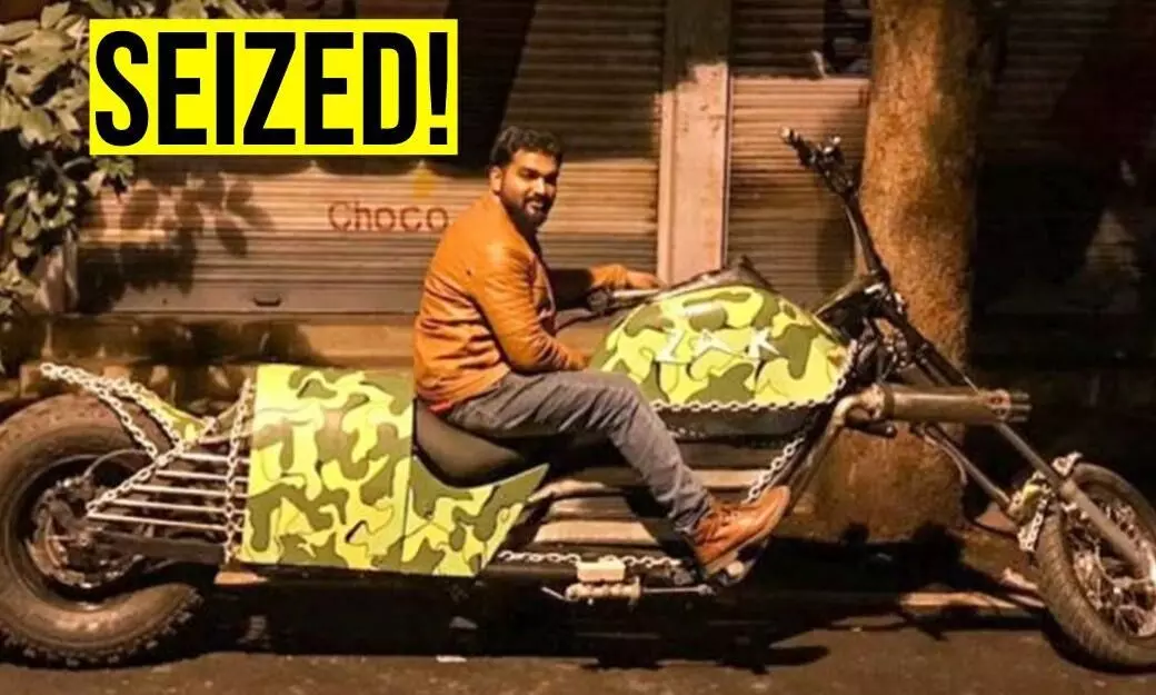 World-record winning modified chopper parked in workshop World-record winning modified chopper parked in workshop