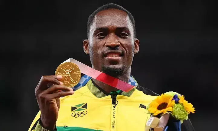 വേദി മാറിയെത്തി, വളണ്ടിയറുടെ സഹായത്തോടെ ടാക്​സിയിൽ ട്രാക്കിലേക്ക്​​; ഒടുവിൽ സ്വർണനേട്ടം