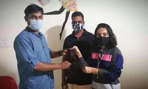 അർബുദ രോഗികൾക്കായി മുടി മുറിച്ച് നൽകി