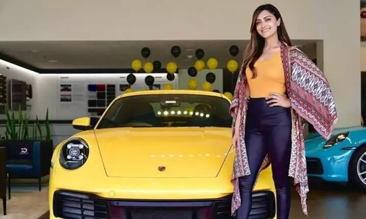 Malayalam movie actress Mamta Mohandas buys Porsche 911 Carrera