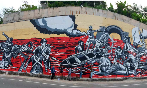 ക​ലാ​പം അ​ഞ്ചു​തെ​ങ്ങി​ലോ ആ​റ്റി​ങ്ങ​ലി​ലോ?  ചു​മ​ർ​ചി​ത്ര​ത്തിൻെറ പേ​രി​ൽ വി​വാ​ദം കൊ​ഴു​ക്കു​ന്നു