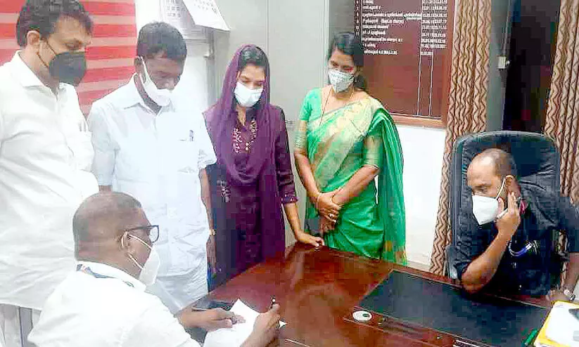 Two secretaries at the same table in the Thrikkakara Municipal Council
