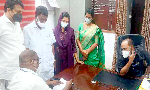 Two secretaries at the same table in the Thrikkakara Municipal Council