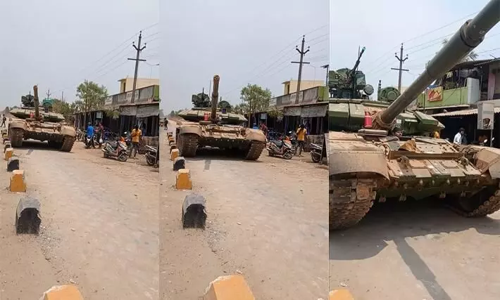 An Army battle tank driving on an Indian Road Video