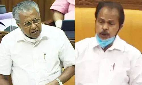 pt thomas-pinarayi vijayan